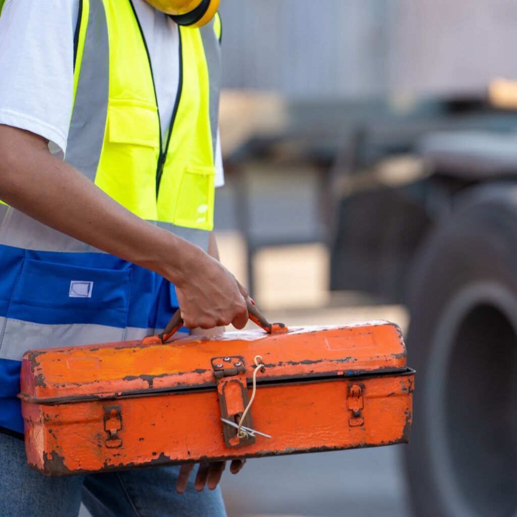 holding a toolbox