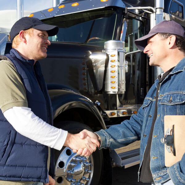 truck drivers shaking hands